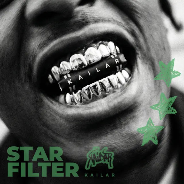Lachender Mund mit silbernen Grills, auf denen Kailar steht, dazu „Star Filter“